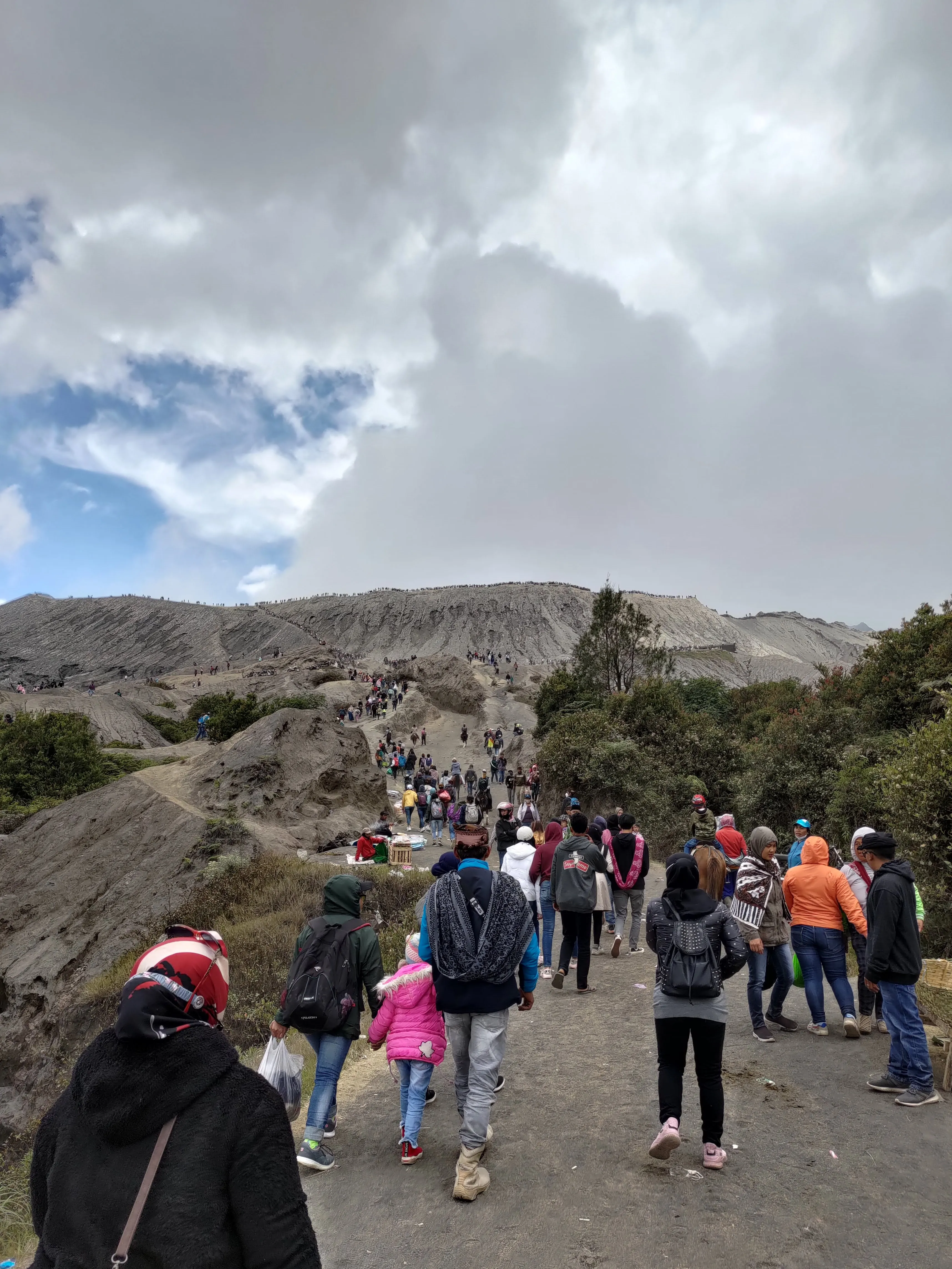 Trail of tourist going the same way to the top